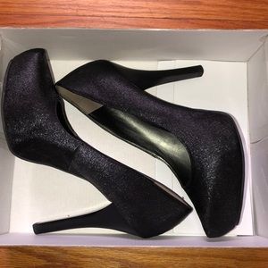 Black heels by Carlos Santana